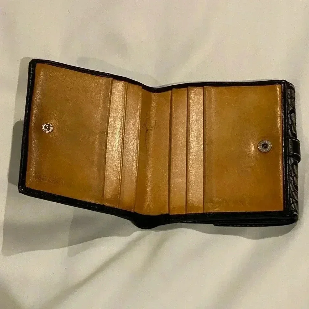 Coach signature bi-fold wallet